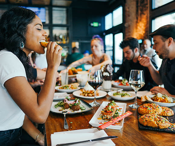 Image of people eating at a restaurant